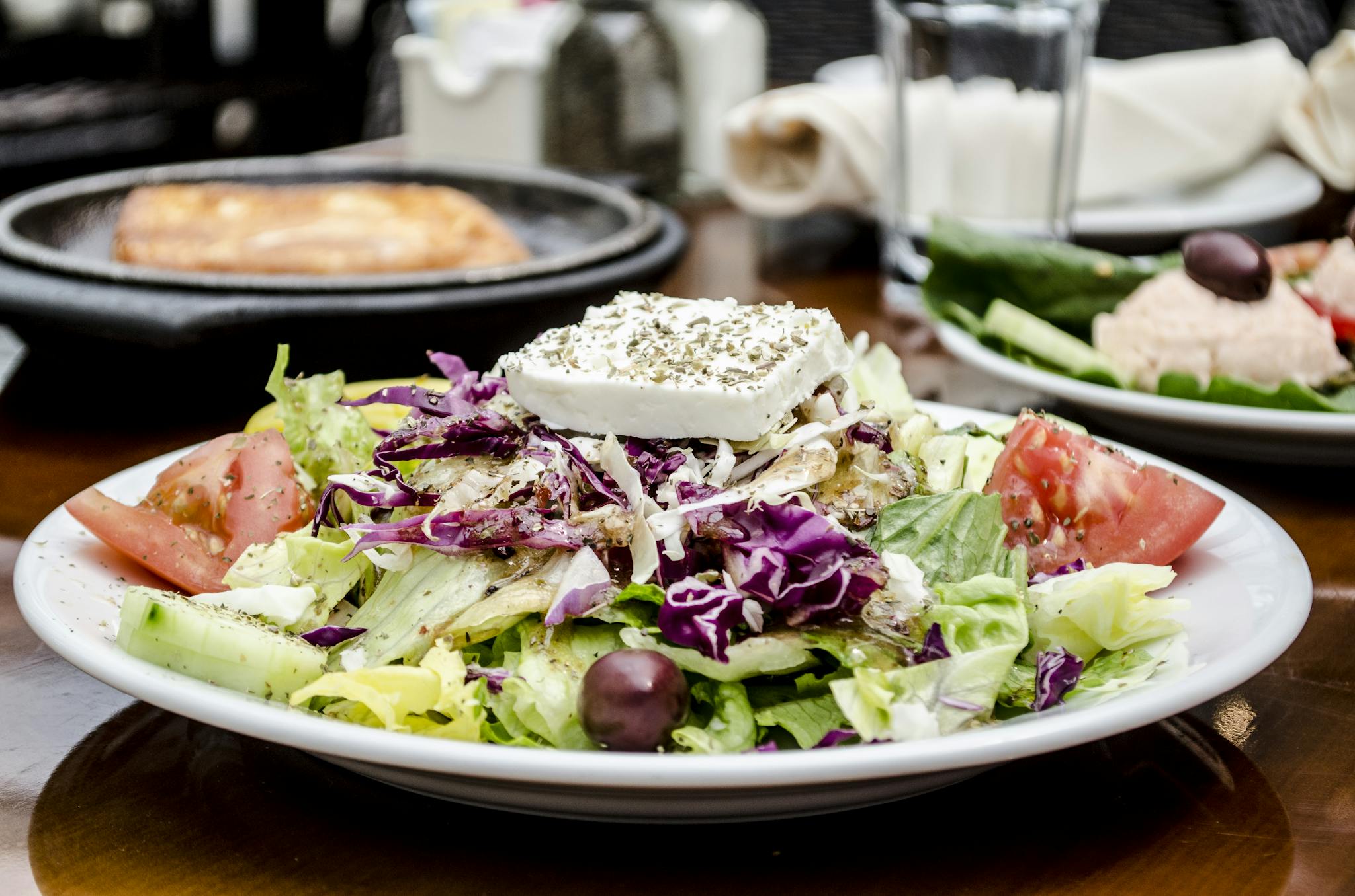 A delicious and colorful Greek salad with feta cheese, tomatoes, and olives, perfect for a healthy meal.